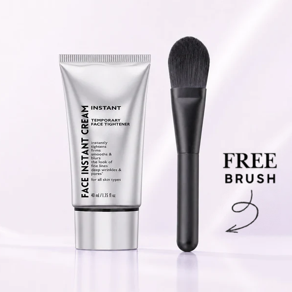 Silver face cream tube with a black application brush