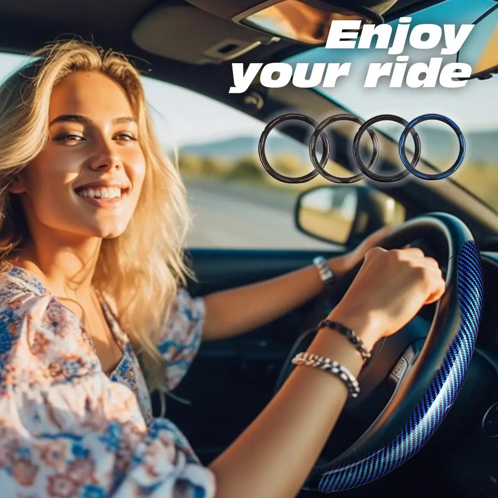 Driver holding a steering wheel with a Sapphire Blue cover