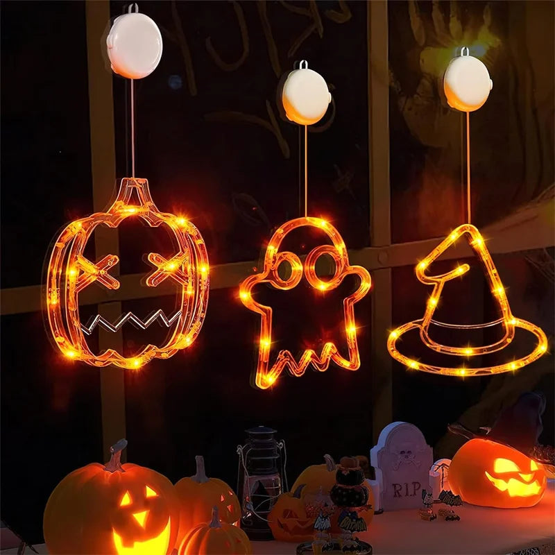 Pumpkin, ghost and witch hat lights in a Halloween display