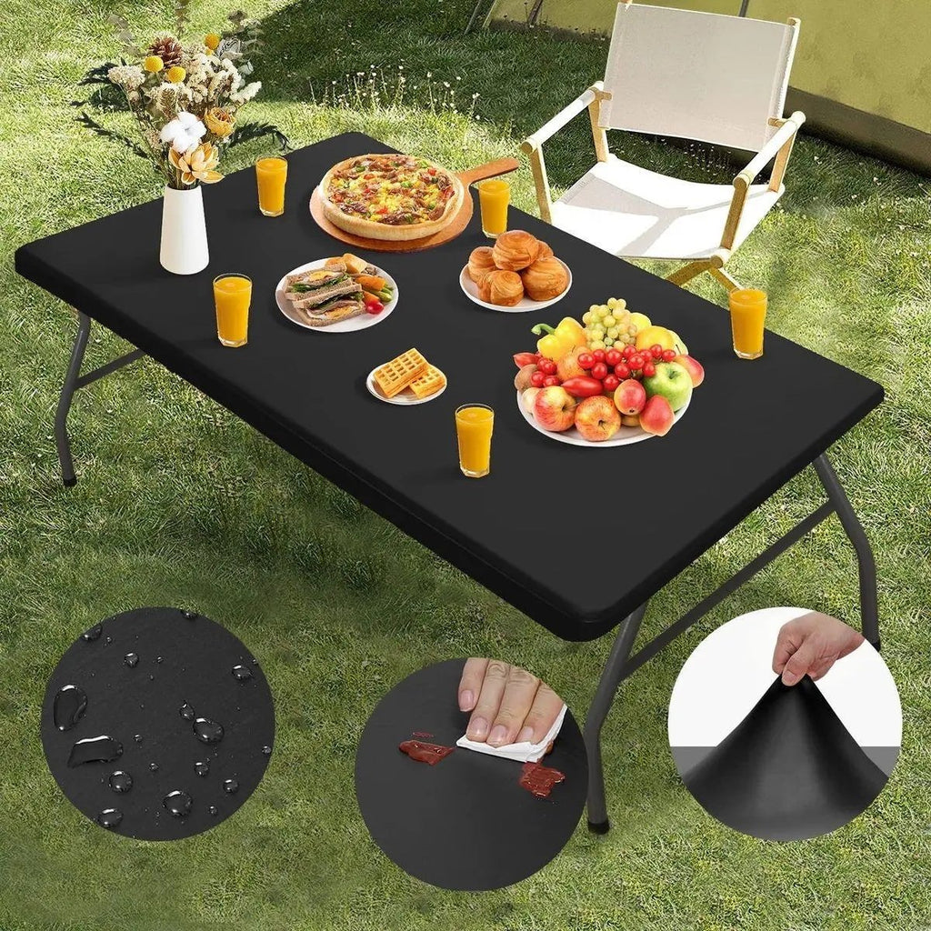 Black fitted tabletop cover with outdoor meal