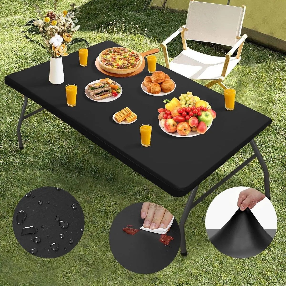 Black fitted tabletop cover with outdoor meal