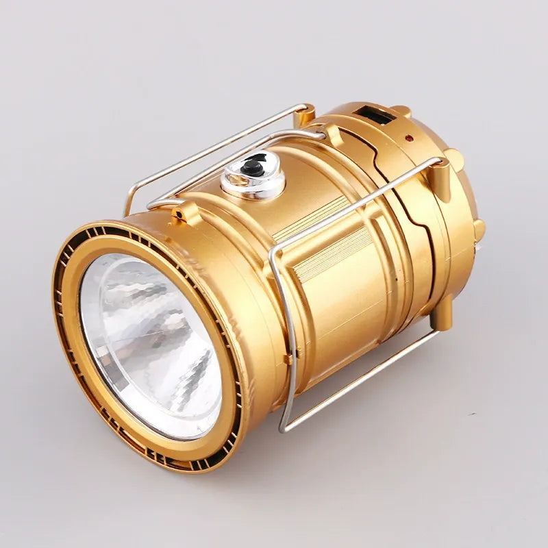 Gold lantern with front flashlight lens