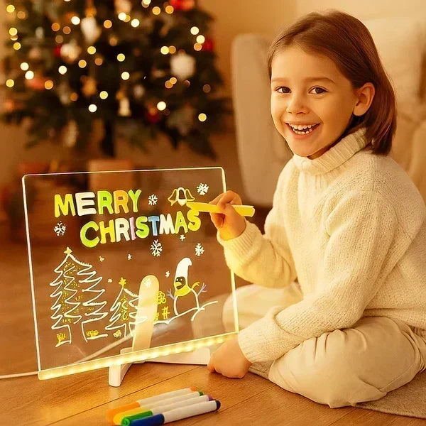 A glowing Christmas drawing displayed on an acrylic board