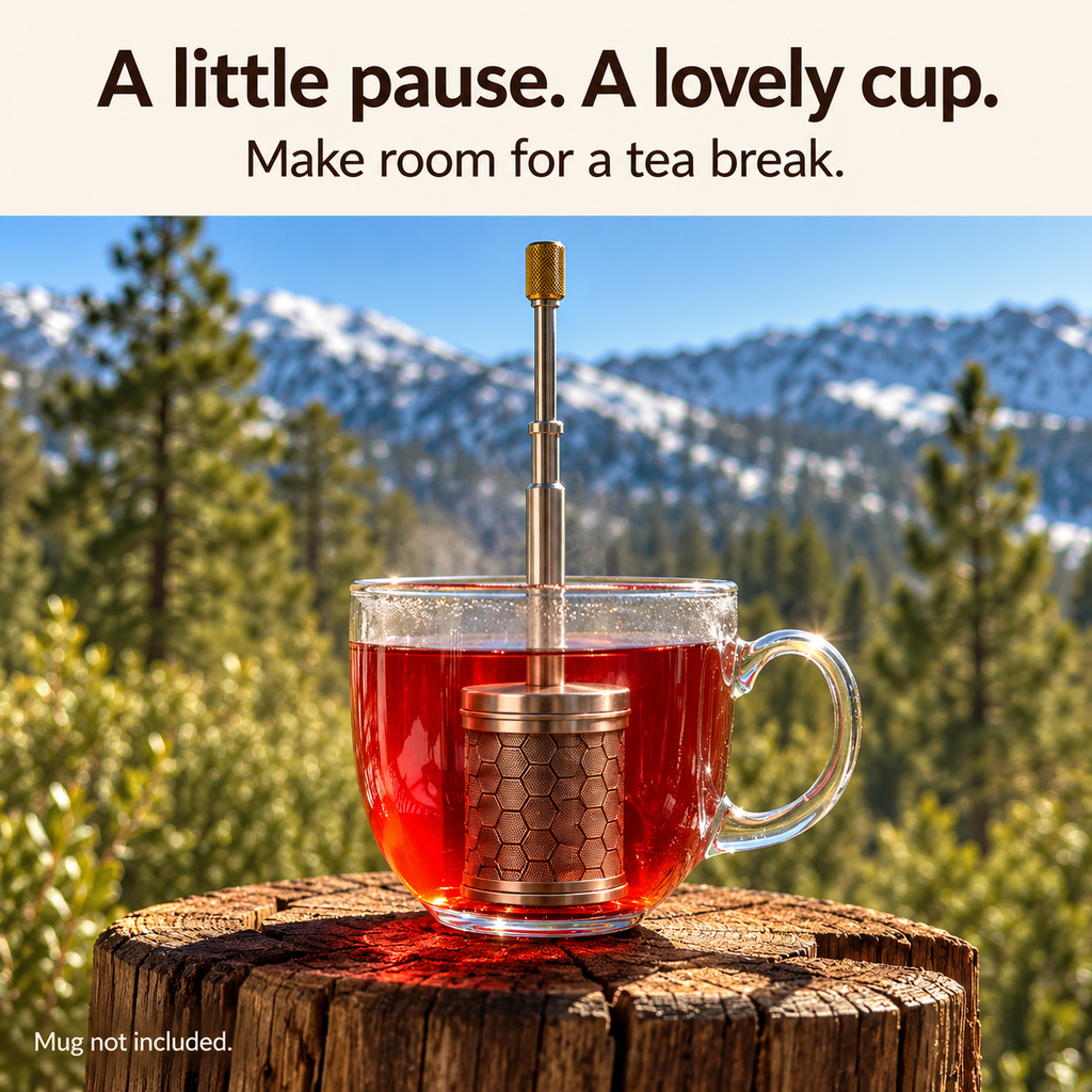 Tea and manual brewer against a mountain landscape