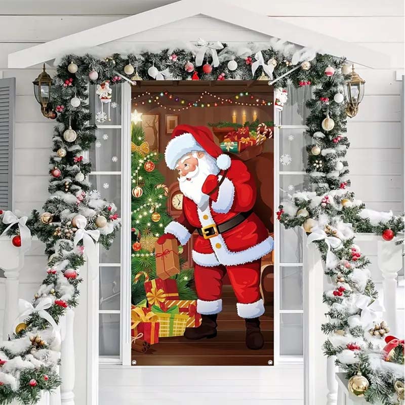Santa door-cover artwork on a doorway framed with snowy garland