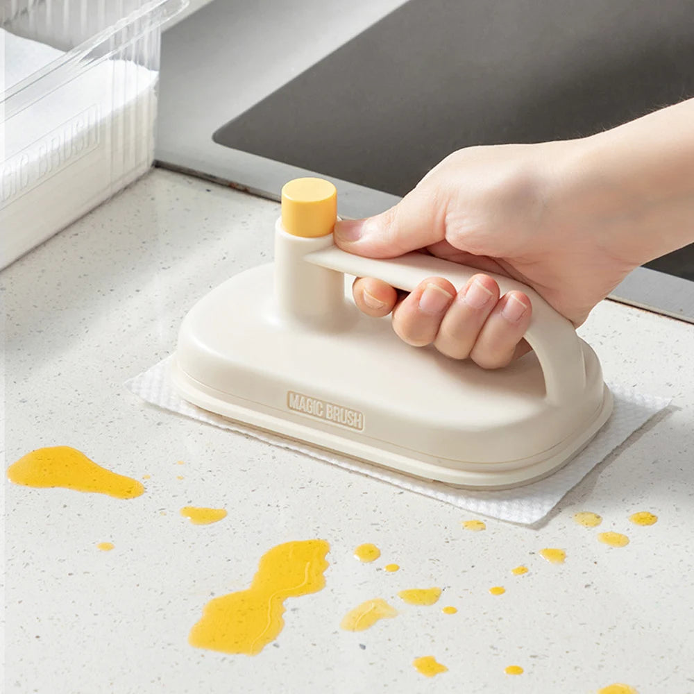Reusable brush wiping a kitchen countertop