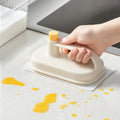 Reusable brush wiping a kitchen countertop