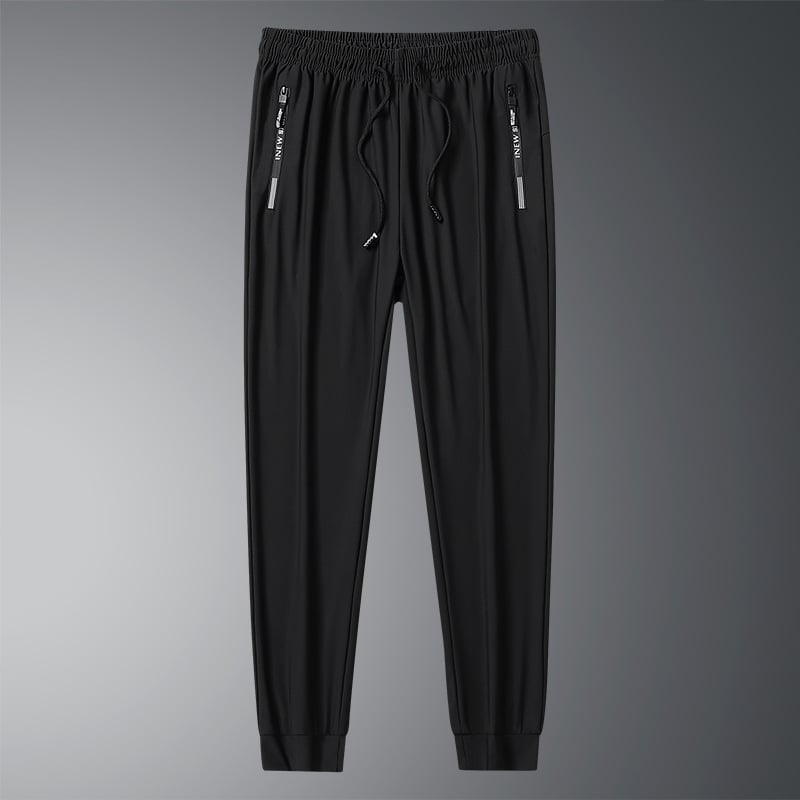 Front view of black pants with cuffed hems