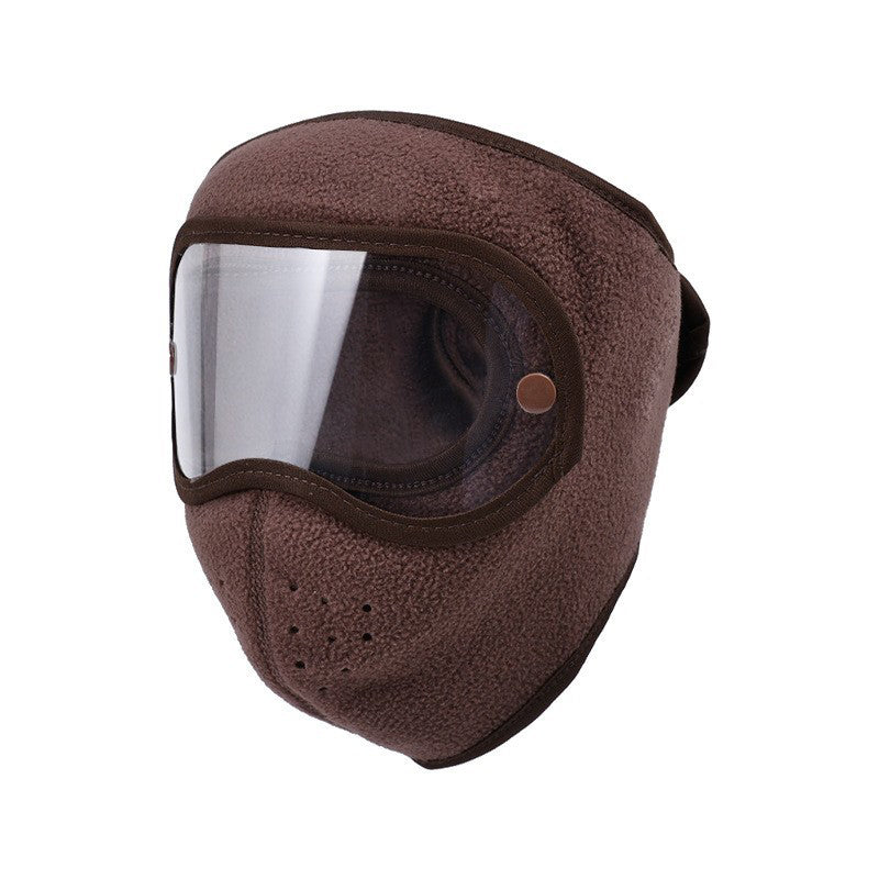 Coffee-colored face mask with clear goggle lens